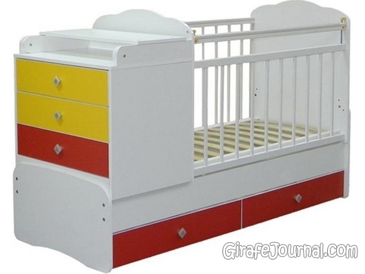 Детская овальная кроватка с пеленальным столиком